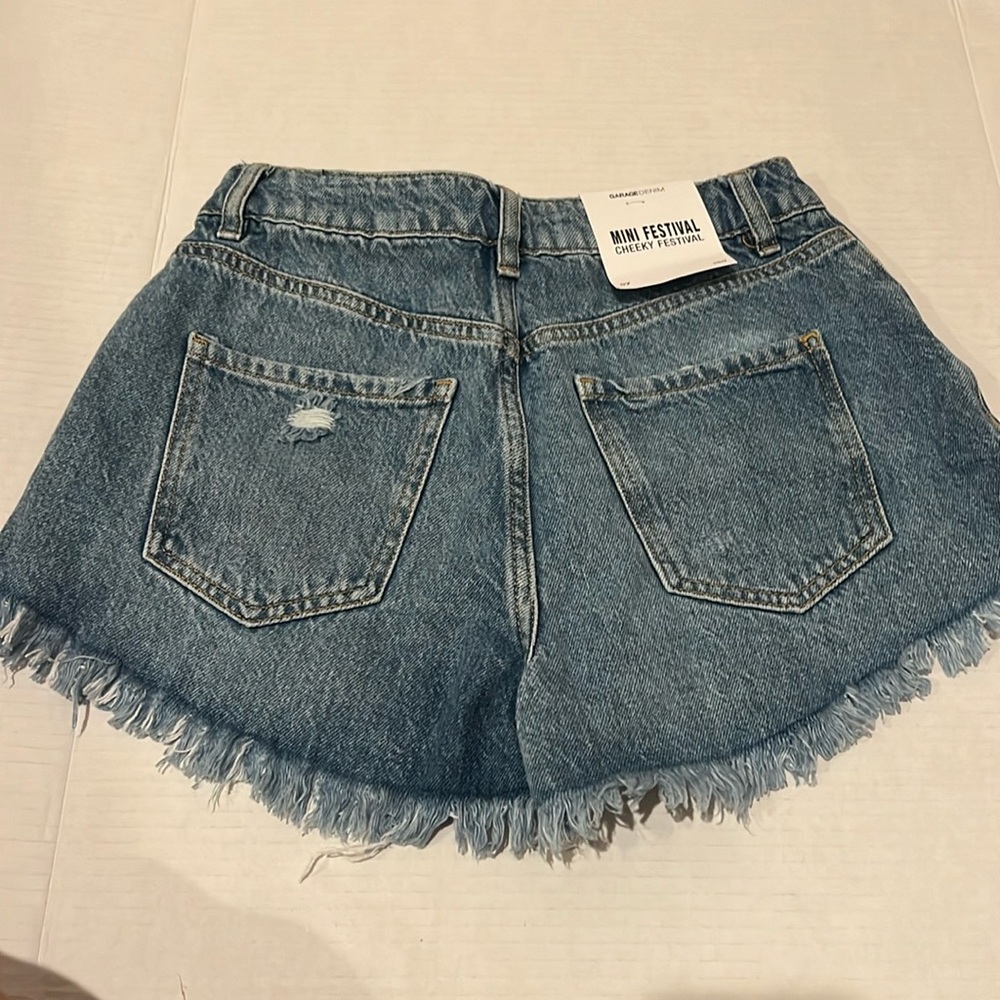 Garage mini festival Jean shorts. New with tags.